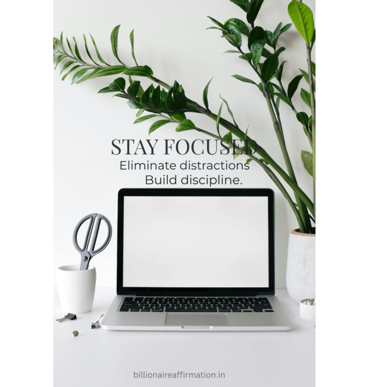 Minimal clean desk setup with laptop and plant representing stay focused affirmations and productivity mindset